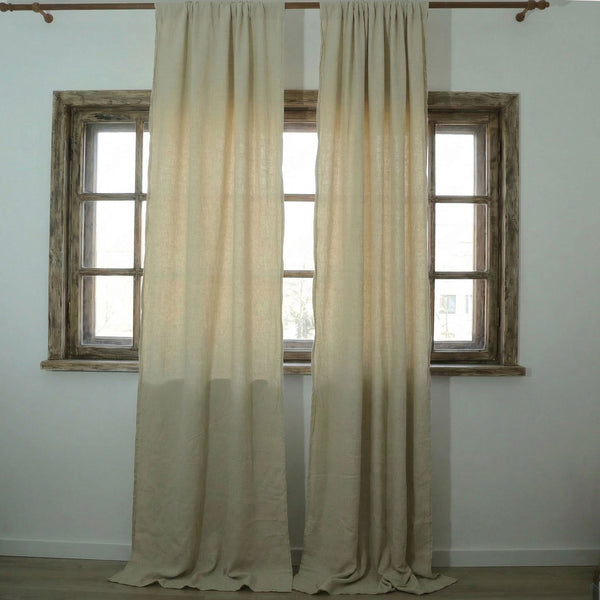 Draperie rustică din mix de in și bumbac nuanța natur cu textură vizibilă de fibre crude.
